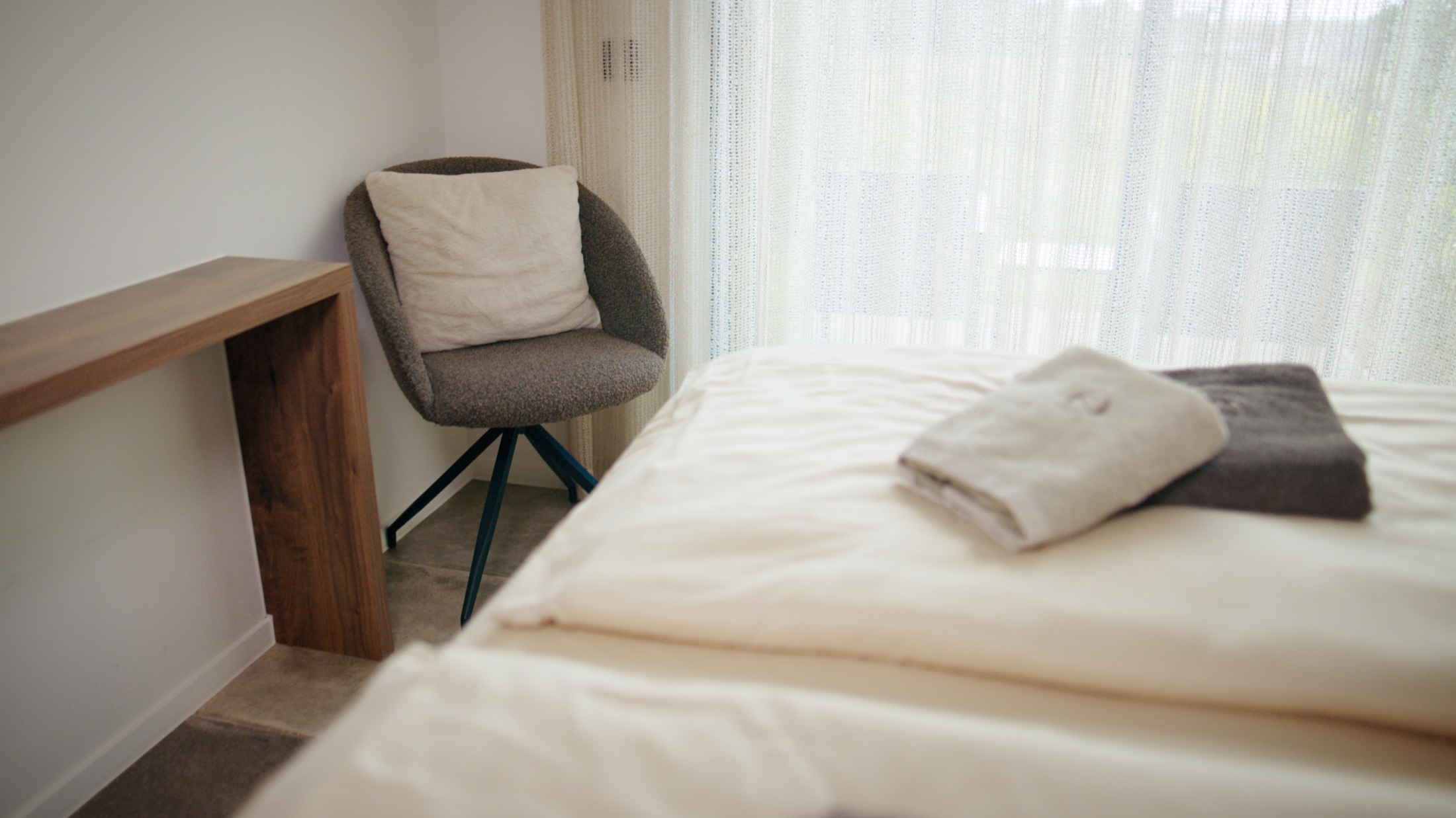 Een stijlvolle slaapkamer in Au Porte Bonheur